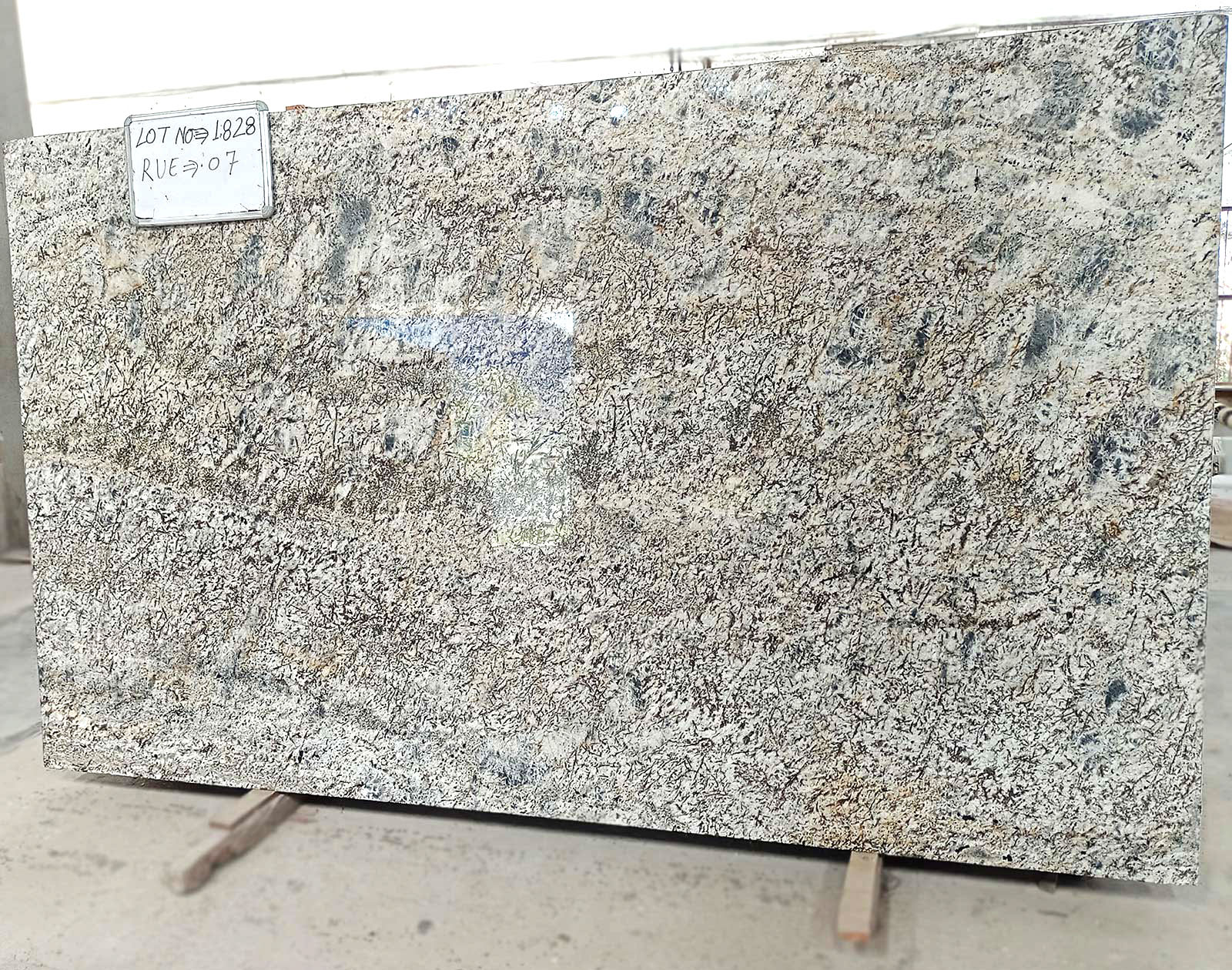 Alaska White Granite Gangsaw Slabs Manufacturer & Exporter in India
